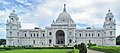 The Victoria Memorial Hall in Kolkata, former capital of British India. It was designed by Sir William Emerson intended to serve as a tribute to the success of the British Empire in India. The architecture is a unique mix of both British and Mughal.