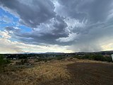 A seasonal monsoon storm approaching the fire on July 9