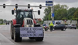 Trekker met protestbord in Den Haag, 1 oktober 2019