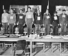 16 der 19 Angeklagten des Dachauer Dora-Prozesses