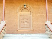 Plaque in the main entrance of the Main Building, also known as Old Main and the Normal School.