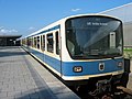Münchner U-Bahn-Wagen mit zweigeteilter Fallblattanzeige für die Liniennummer einerseits und das Fahrtziel andererseits