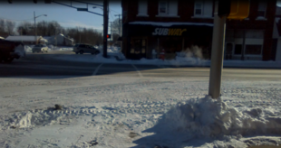 Downtown Greentown in the winter. Showing the light, and the corner which Subway sits.