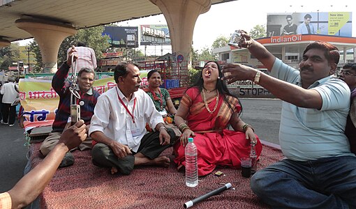 A delegate exposing a so-called 'miracle' of eating fire at the 8th FIRA conference in Nagpur