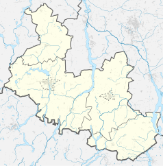 Mapa konturowa powiatu mogileńskiego, u góry nieco na lewo znajduje się punkt z opisem „Parafia Świętej Trójcy”