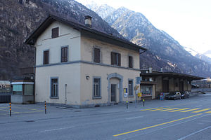 Three-story building with gabled roof