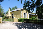 This late nineteenth century dwelling, with its predominantly Victorian features, forms an integral part of the historic core of Swellendam in the immediate vicinity of the Drostdy.