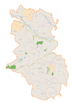 Mapa konturowa gminy Koniusza, u góry nieco na prawo znajduje się punkt z opisem „Rzędowice”