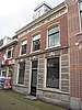 Dwars huis van twee bouwlagen (voormalige Café-woonhuis)