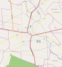 Mapa konturowa Zwolenia, w centrum znajduje się punkt z opisem „Parafia Podwyższenia Krzyża Świętego w Zwoleniu”