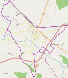 Mapa konturowa Koła, po lewej znajduje się ikonka zamku z wieżą z opisem „Zamek w Kole”