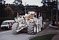 A CMI road recycler milling old road surface and blending lime in a single pass