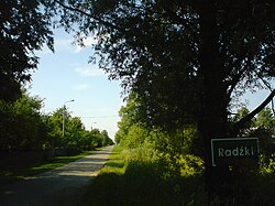 Road sign in Radźki