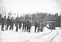 Skiers waiting for the streetcar, Rockliffe Park, c1913