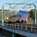 Un treno TAF della linea FL3 in entrata alla stazione Gemelli