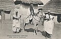 Guinea, circa 1900-1920. The Malinké head of Toumanéa with two griots.[15] Mandinkas had griot lutes known as koni.[16]