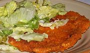 Polish kotlet z kurczaka breaded chicken cutlet with cabbage salad