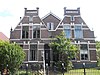 Dubbel woonhuis, erachter rijtje van drie