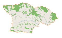 Mapa konturowa gminy Szerzyny, blisko centrum u góry znajduje się punkt z opisem „Szerzyny, cm. wojenny nr 33”