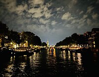 Oudeschans at night with Montelbaanstoren in the distance