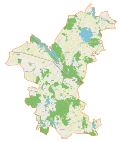 Mapa konturowa gminy Wydminy, blisko centrum u góry znajduje się punkt z opisem „Mazuchówka”