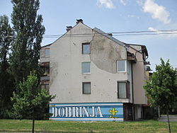 Mural painting in Dobrinja, Sarajevo (Bulevar Mimara Sinana), by the Manijaci football fan group. June 2014