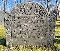 Schist marker featuring diamond and heart borders. Andover CT.