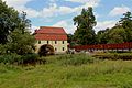 August 2012 Die Elstermühle mit der neuen Brücke im Juli 2012 in Plessa.