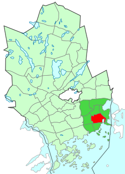 Location of Tapiola (red) within Espoo (light green) and Suur-Tapiola (dark green)