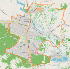 Mapa konturowa Tomaszowa Lubelskiego, blisko centrum na lewo znajduje się punkt z opisem „Izba Pamięci Terroru Komunistycznego”