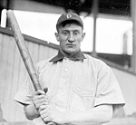 A baseball player looking directly at the camera