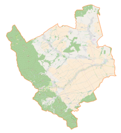 Mapa konturowa gminy Stoszowice, po prawej znajduje się ikonka pałacu z opisem „Zamek w Stoszowicach”