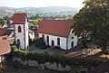 Glocken- und Torturm neben der frühgotischen Wehrkirche in Wersau im Odenwald