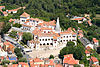 Buildings with red roofs on a hillside