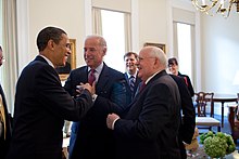 Photo of Obama, Biden and Gorbachev smiling at each other