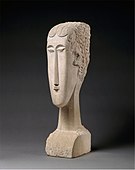 Cap de femeie; de Amedeo Modigliani; 1912; calcar; înălțime: 68,3 cm, lățime: 15,9 cm, adâncime: 24,1 cm; Muzeul Metropolitan de Artă (New York City)