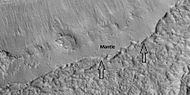 Close view of the edge of mantle, as seen by HiRISE under the HiWish program Location is Hellas quadrangle.