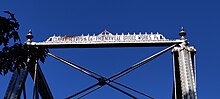 A photograph of an inscription of the names of the fabricators of the bridge, located on top of one of its entryways. It reads: "CLARKE, REEVES & Co. PHOENIXVILLE BRIDGE WORKS. Pa."