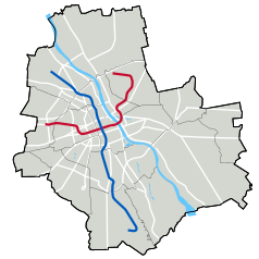 Mapa konturowa Warszawy, w centrum znajduje się punkt z opisem „Dworzec Wileński”