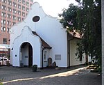 Single storey building with plastered shale stone walls. Front and rear Cape Dutch gables added at l This remarkable little building which houses a unique collection of Voortrekker relics is situated in Church Street, below Market Square. When the Voortrekkers entered Natal from the Orange Free State in the beginning of 1837, they suffered dreadful disas Architectural style: Dutch-style building. Type of site: Church Previous use: church. Current use: museum. From Boshoff Street turn into Church Street, towards City Hall. Church is third structure on left.. Built in 1840 to honour a vow that they would build a church 'in honour of God should He grant them