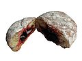 A retouched image of a jelly doughnut (aka Berliner) with the background removed.