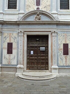 Renaissance margents on two pilasters of the entrance of the Santa Maria dei Miracoli, Venice, by Pietro Lombardo, 1481-1489