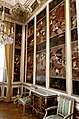 Chinesisches Kabinett, Schloss Nymphenburg, München. Echte Chinesische Malereien umrahmt von kleinen Feldern mit europäischen schwarzen Lackarbeiten.