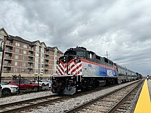 Metra EMD F59PH No. 97 idles at the Franklin Park Railroad Daze in June 2024.