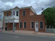 Vernetta Hotel built 1905 and located at 1 Apache St. Originally the known as the Smith Hotel, the hotel's owner was Mrs. Elizabeth Smith, an African-American businesswoman. It is now known as the Hassayampa Building, it contains offices for Remuda Ranch. The property was listed in the National Register of Historic Places on July 10, 1986. Reference number #86001593