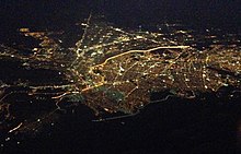 Aerial view of El Paso, Texas and Ciudad Juárez, Chihuahua; the brightly lighted border can clearly be seen as it divides the two cities at night.