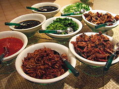 Toppings served with tinutuan