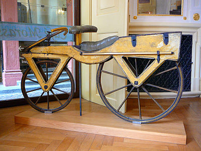Wooden draisine (around 1820), the first two-wheeler and as such the archetype of the bicycle
