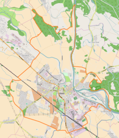 Mapa konturowa Oławy, blisko centrum na dole znajduje się punkt z opisem „Parafia Matki Bożej Pocieszenia”