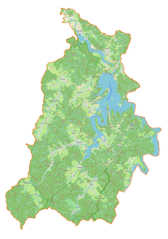 Mapa konturowa gminy Solina, blisko centrum po prawej na dole znajduje się punkt z opisem „Sakowczyk”